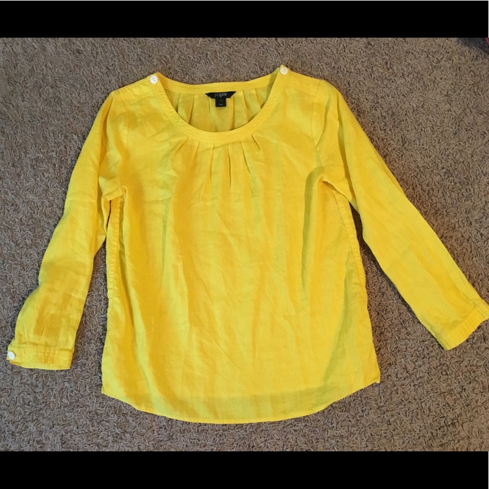 Yellow blouse with white button details